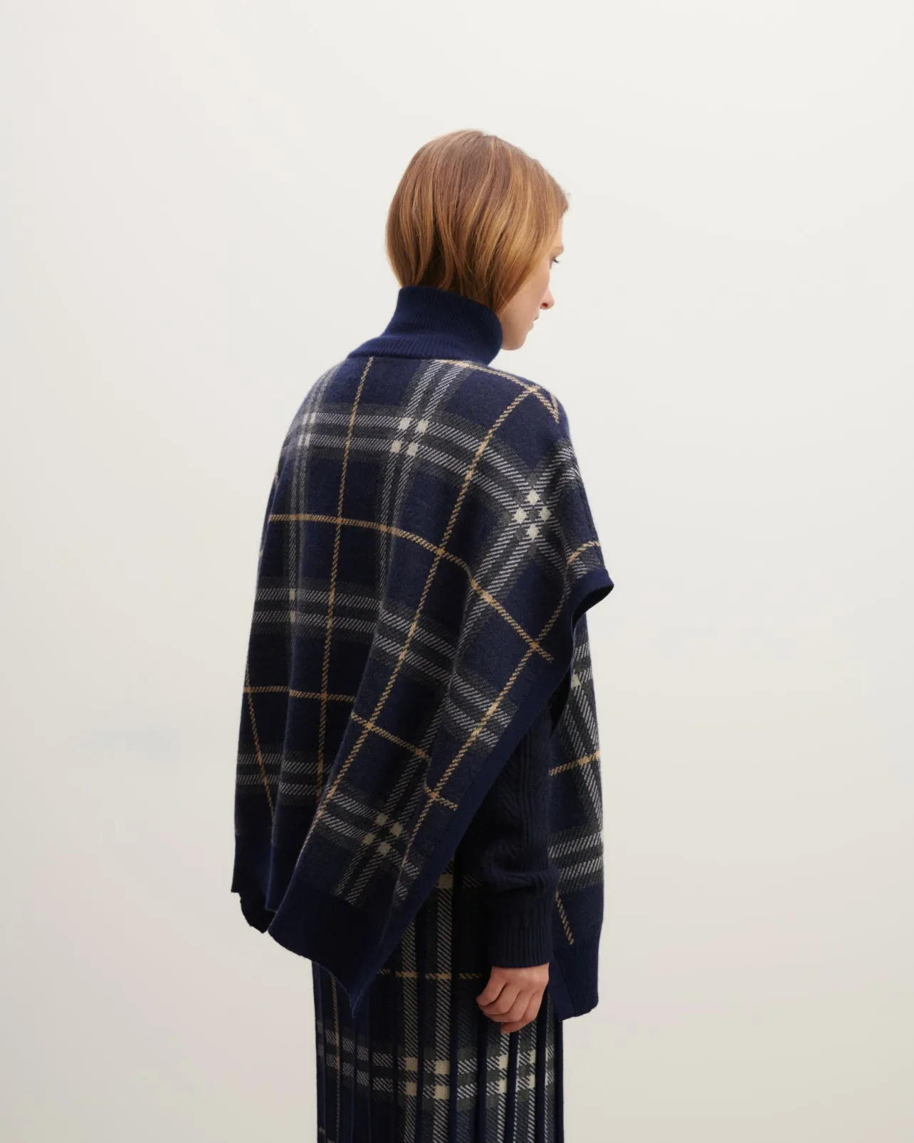 Poncho col roulé tartan