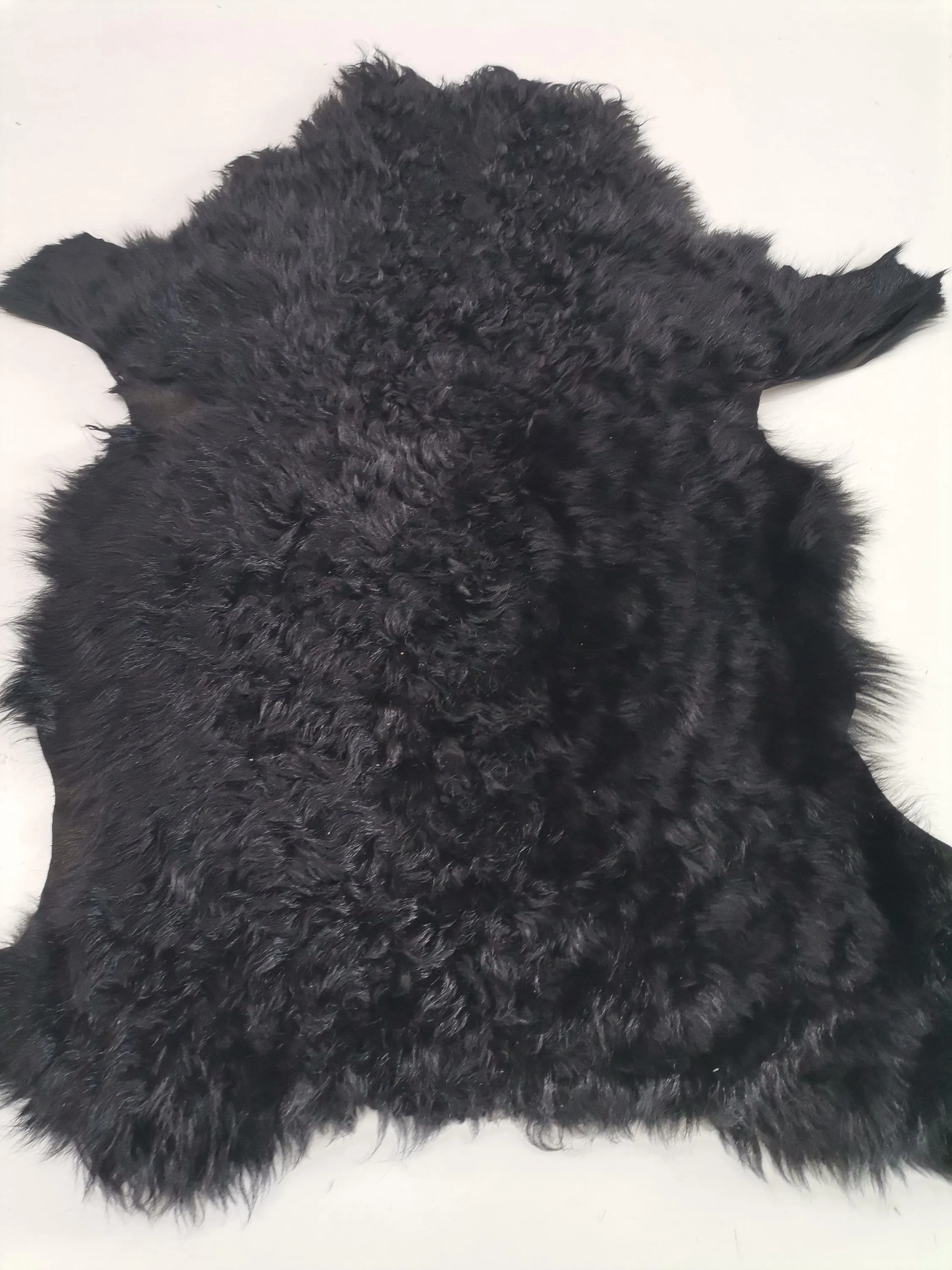 Sheepskin rug shearling leather hide, lambskin curly hair on, natural wool mouton leather